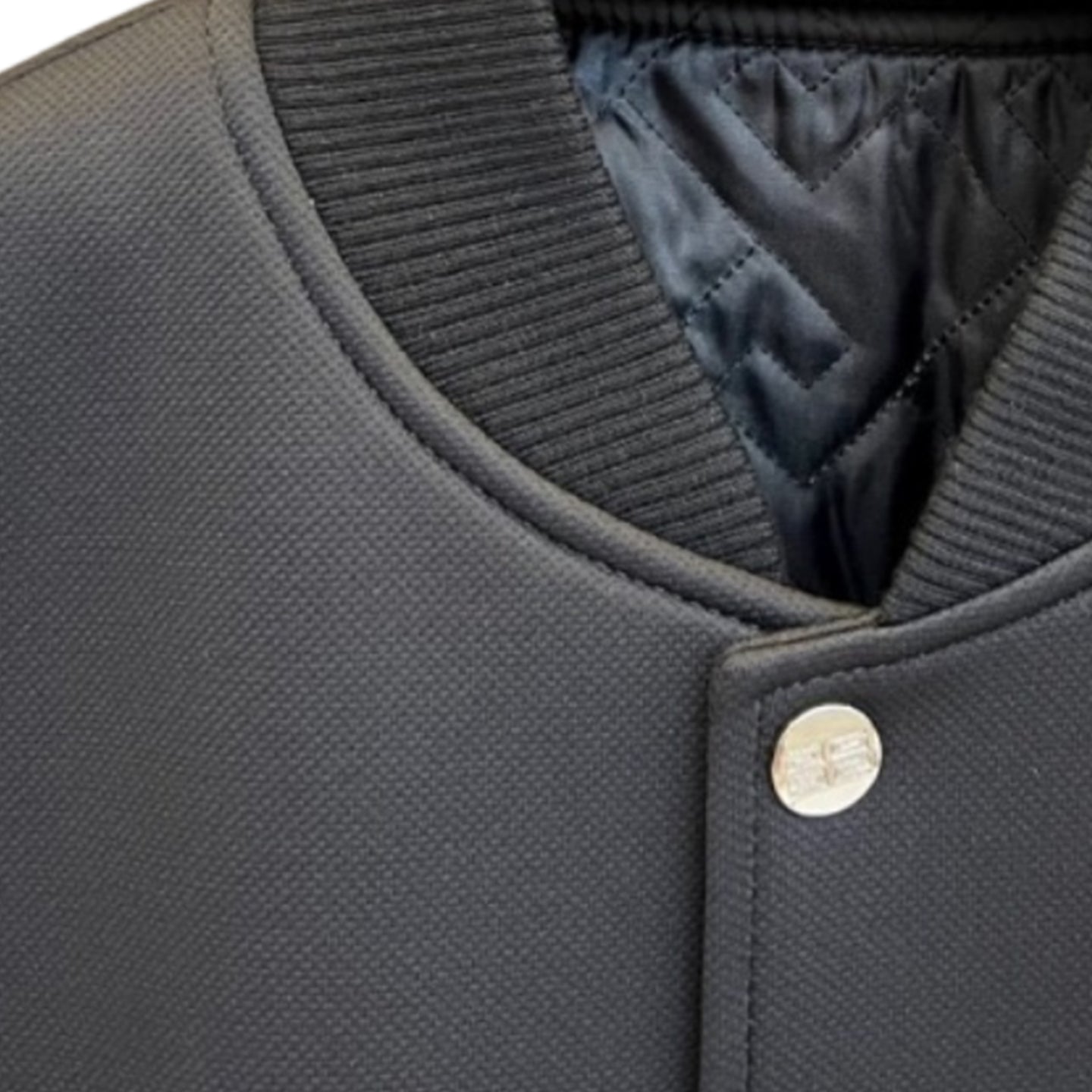 Black & Off-White Varsity Jacket — Leather Sleeves