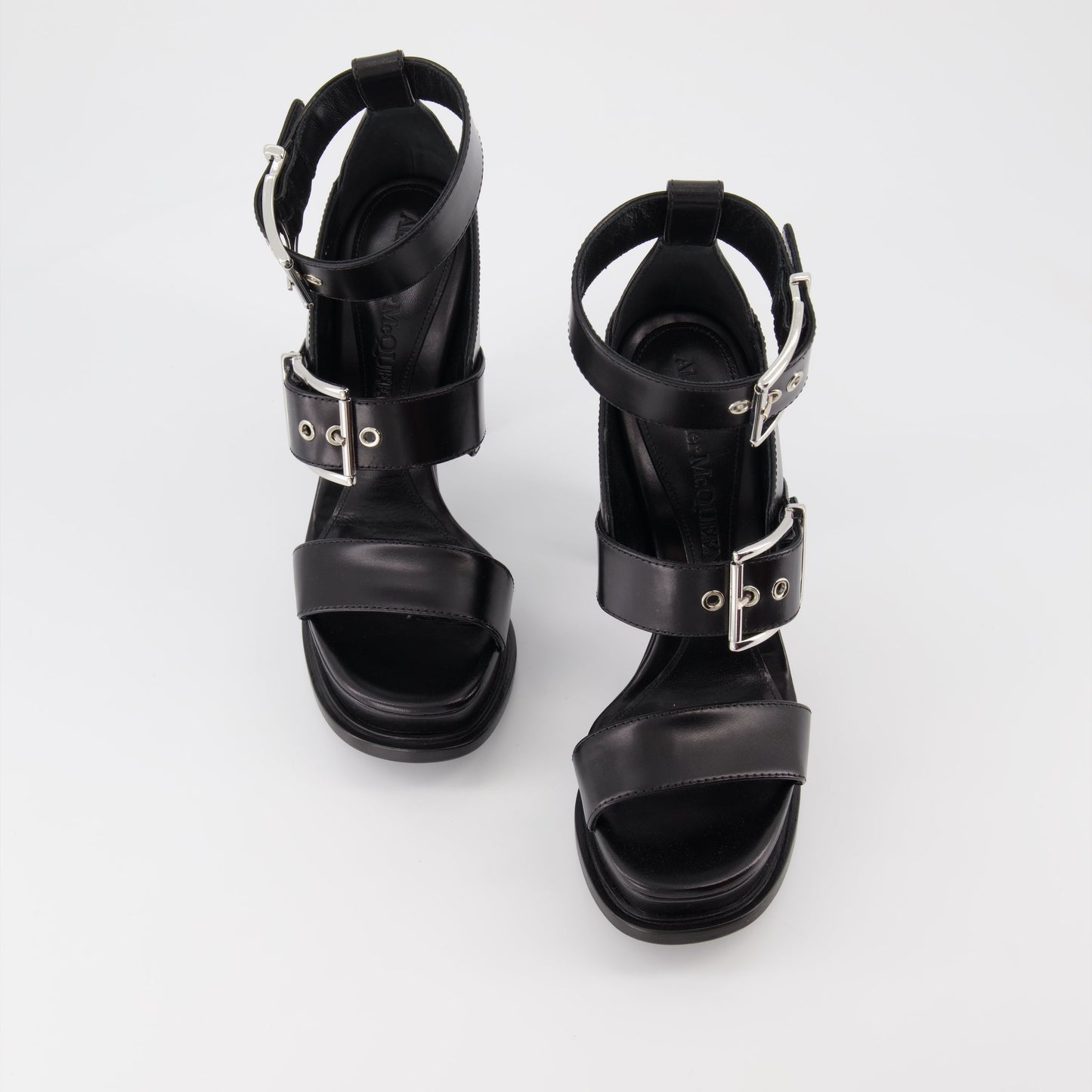 Buckled and platform sandals
