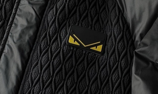 Hooded Puffer Jacket – Geometric Quilt & Monster Patch