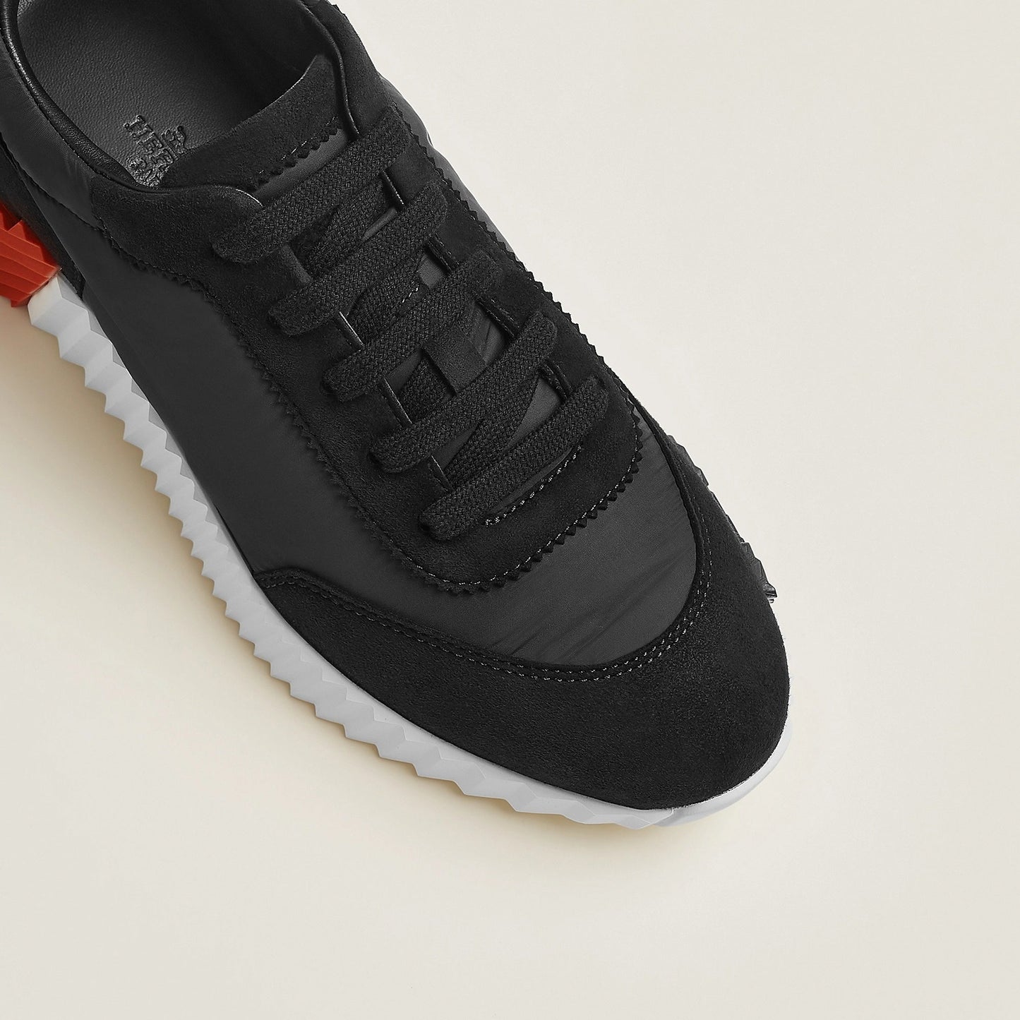 Bouncing Sneakers in Black and Orange